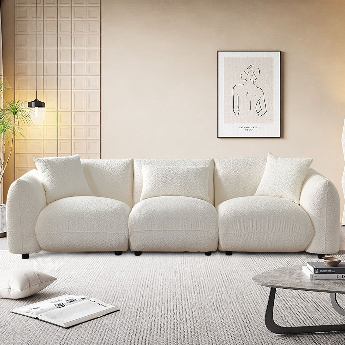 Divano componibile bianco imbottito, confortevole e morbido, con poggiapiedi