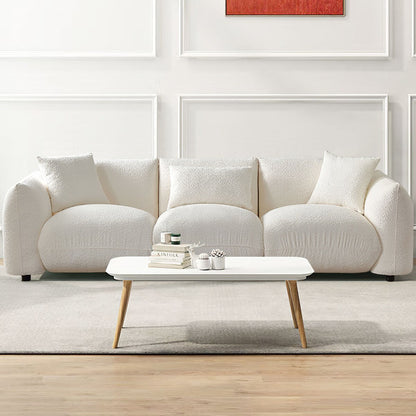 Divano componibile bianco imbottito, confortevole e morbido, con poggiapiedi