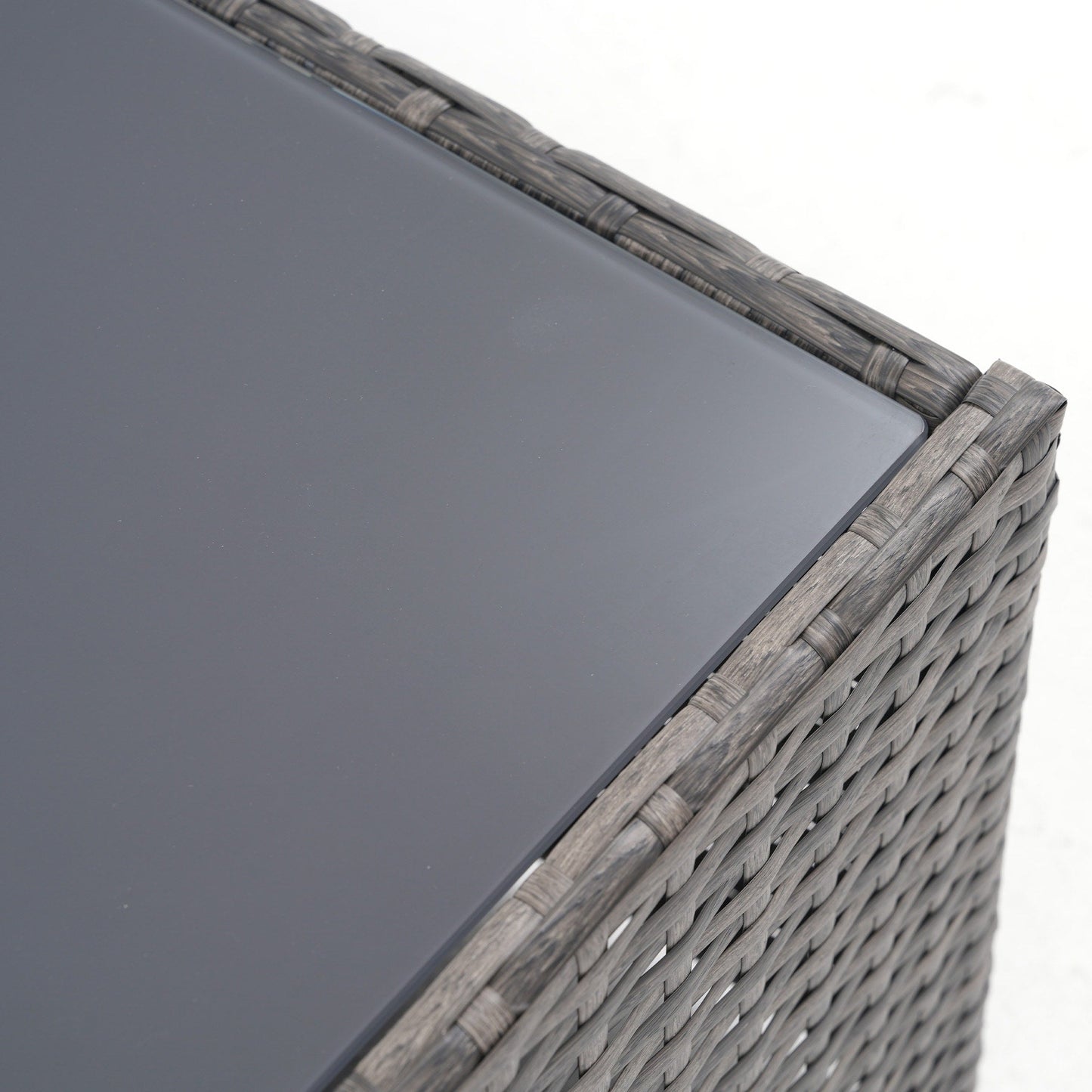 Set da conversazione in rattan per 4 persone con cuscini grigi e tavolo da esterno in vetro temperato