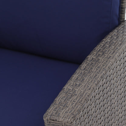 Set da conversazione in rattan per 4 persone con cuscini grigi e tavolo da esterno in vetro temperato