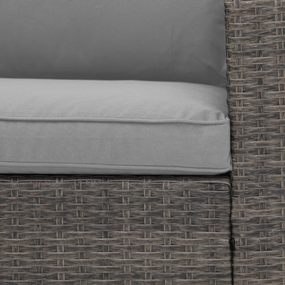 Set da conversazione in rattan per 4 persone con cuscini grigi e tavolo da esterno in vetro temperato