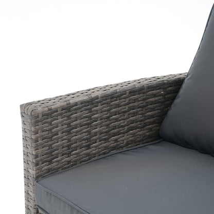 Set da conversazione in rattan per 4 persone con cuscini grigi e tavolo da esterno in vetro temperato