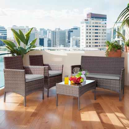 Set di mobili da esterno da 4 pezzi con cuscini, set da conversazione in vimini e tavolino da caffè in vetro