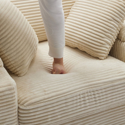 42.12 Divano imbottito in velluto a coste + pouf