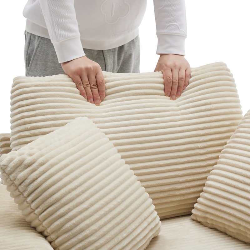 42.12 Divano imbottito in velluto a coste + pouf