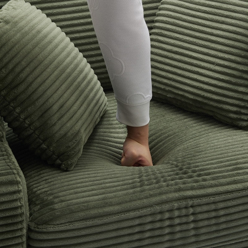 42.12 Divano imbottito in velluto a coste + pouf