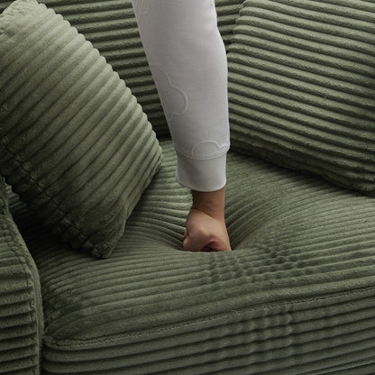 42.12 Divano imbottito in velluto a coste + pouf