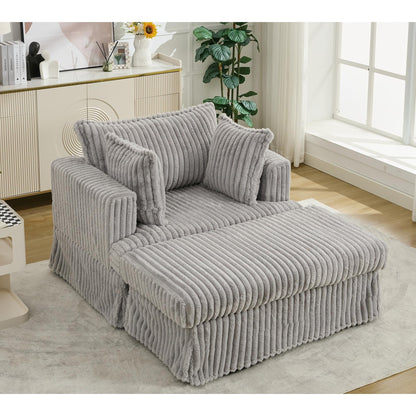 47.7 Chaise Longue oversize in velluto a coste con pouf