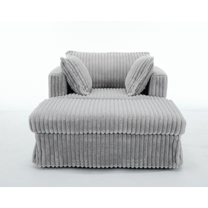 47.7 Chaise Longue oversize in velluto a coste con pouf