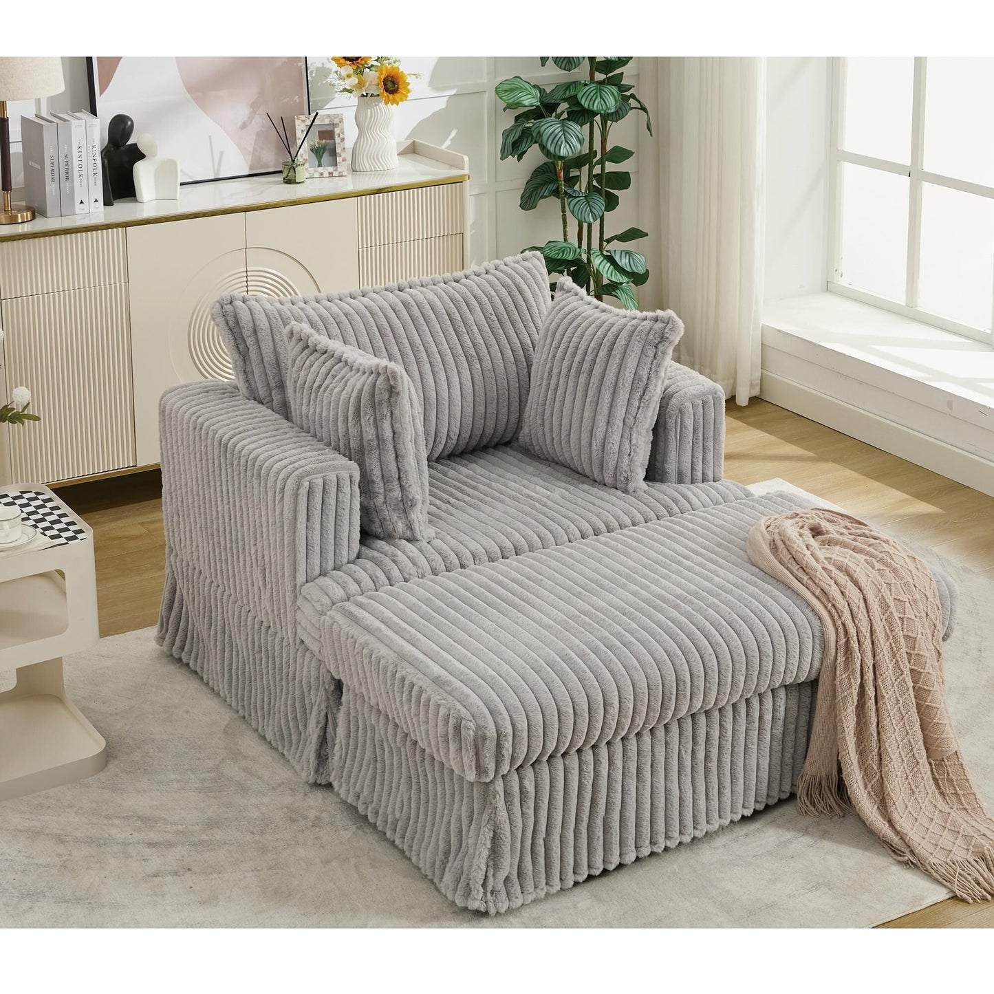 47.7 Chaise Longue oversize in velluto a coste con pouf