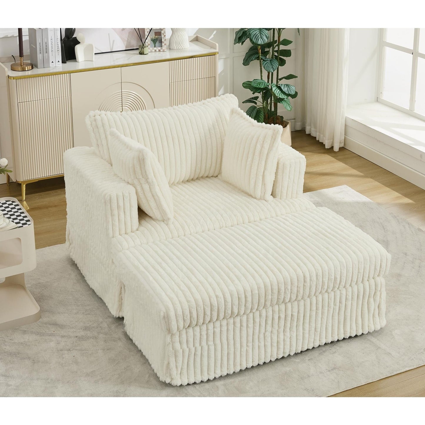 47.7 Chaise Longue oversize in velluto a coste con pouf