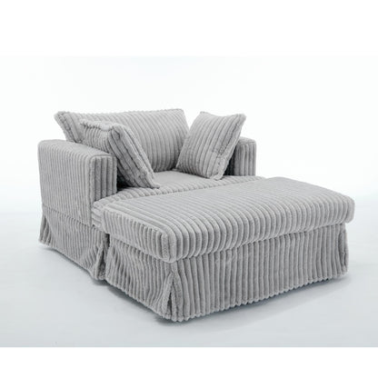 47.7 Chaise Longue oversize in velluto a coste con pouf