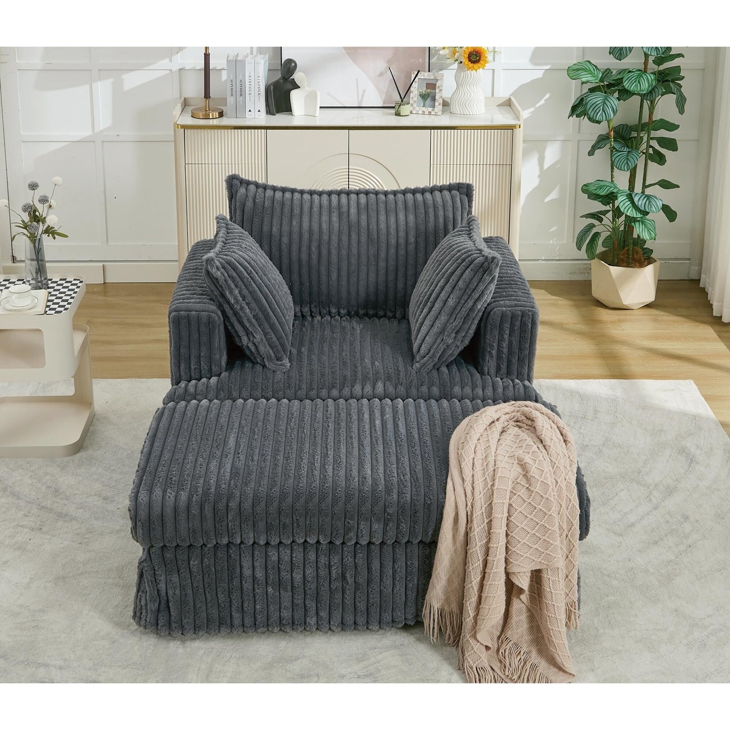47.7 Chaise Longue oversize in velluto a coste con pouf