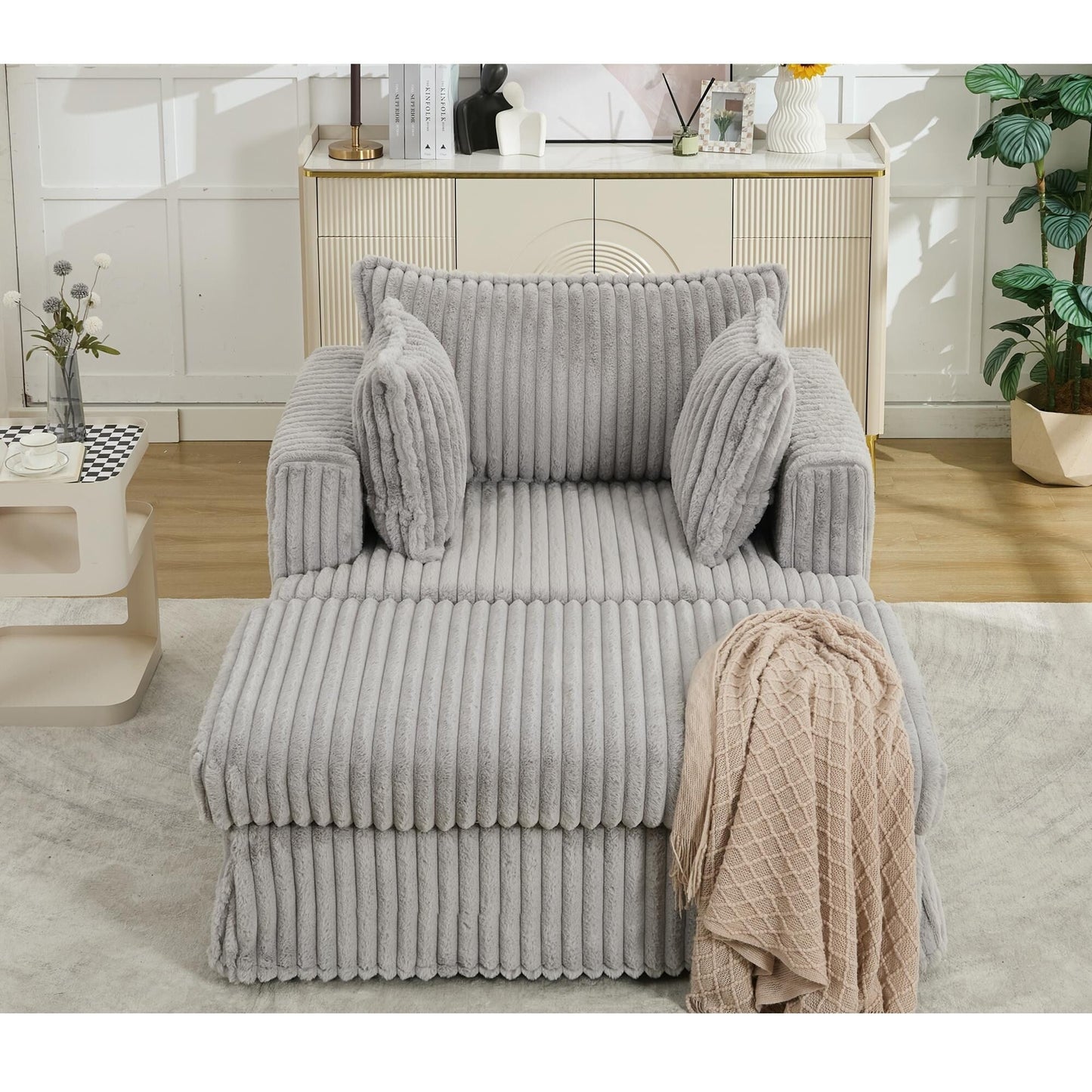47.7 Chaise Longue oversize in velluto a coste con pouf