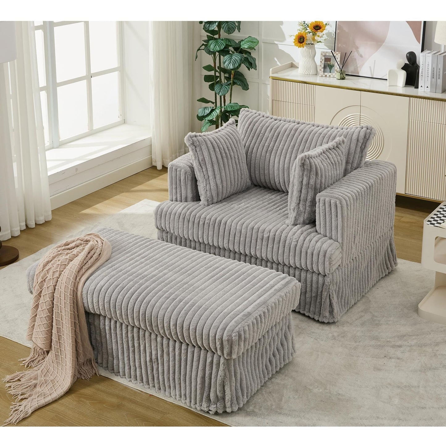 47.7 Chaise Longue oversize in velluto a coste con pouf