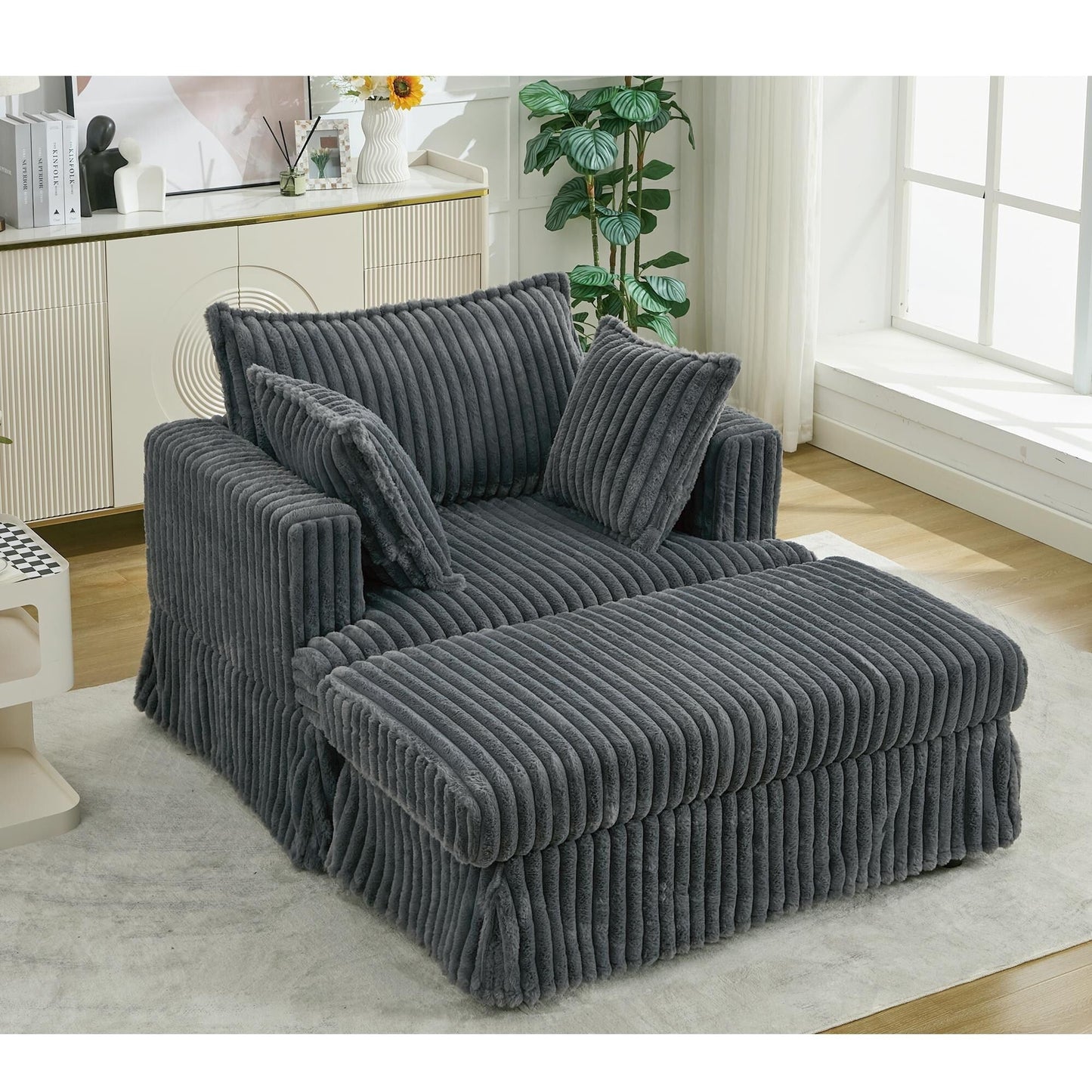 47.7 Chaise Longue oversize in velluto a coste con pouf