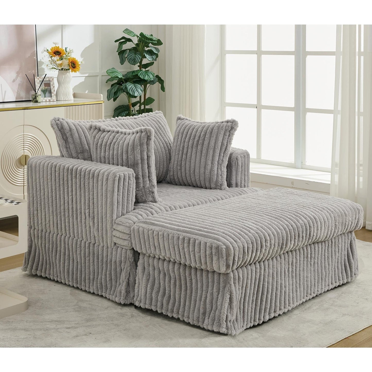 47.7 Chaise Longue oversize in velluto a coste con pouf