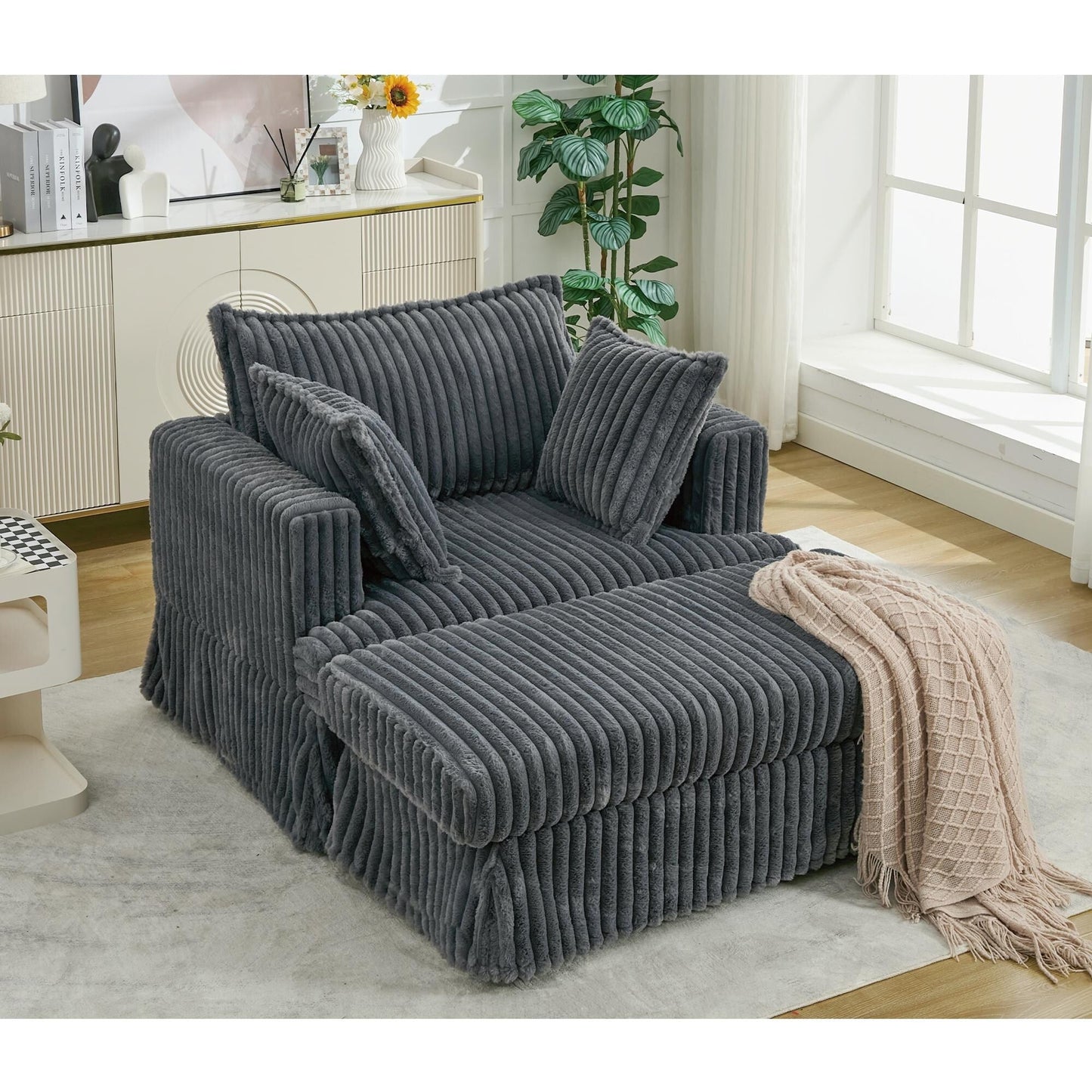 47.7 Chaise Longue oversize in velluto a coste con pouf