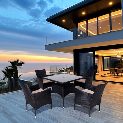 Set da pranzo da esterno in vimini da 5 pezzi con cuscini e tavolo