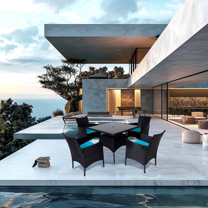 Set da pranzo da esterno in vimini da 5 pezzi con cuscini e tavolo