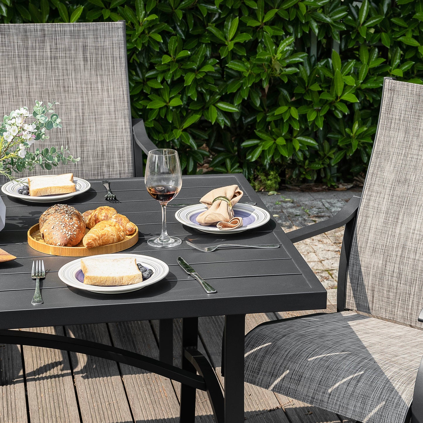 Set da pranzo per esterni da 7 pezzi con sedie fisse e girevoli in textilene