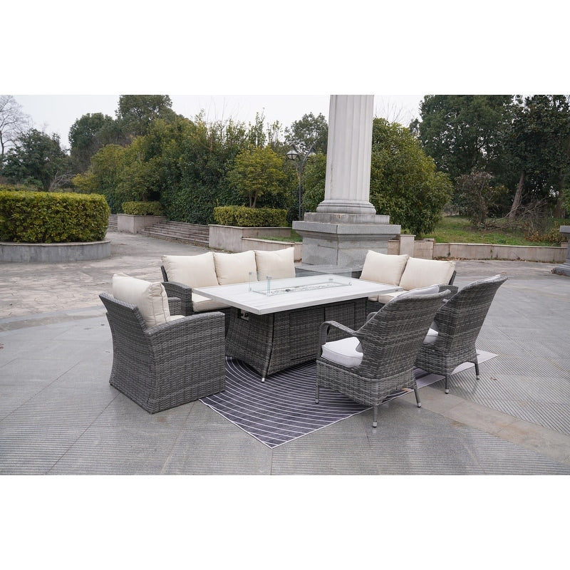 Set di divani da giardino in rattan da 7 pezzi con tavolo da pranzo in alluminio e poltrone