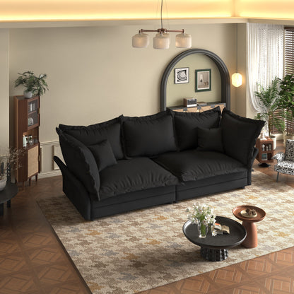 90.55 Divani moderni con seduta profonda e molteplici cuscini grandi e morbidi