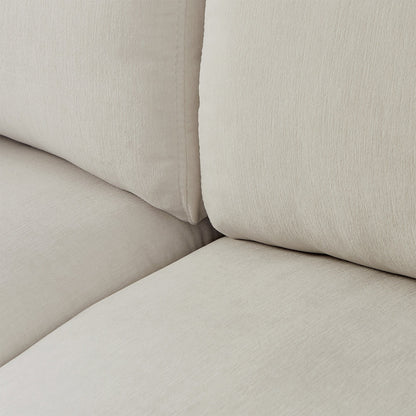 Divano componibile a L in poliestere beige 102.4 con poggiapiedi reversibile, cuscini spessi e gambe in plastica