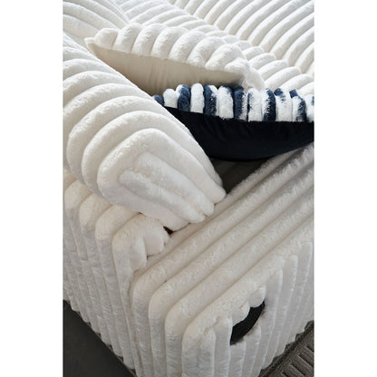 Divano a due posti in velluto a coste beige con pouf e altoparlante Bluetooth