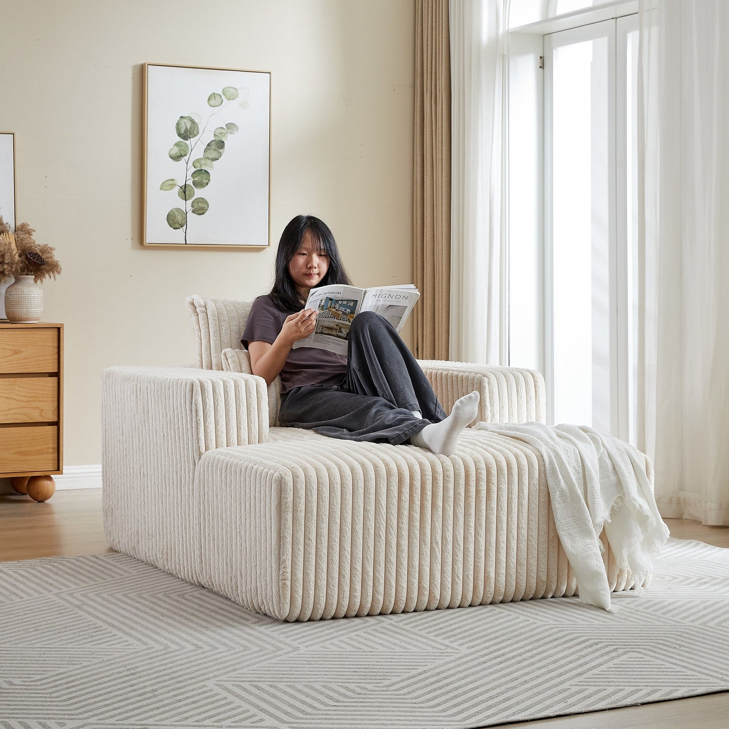 Poltrona in velluto a coste beige con 2 cuscini