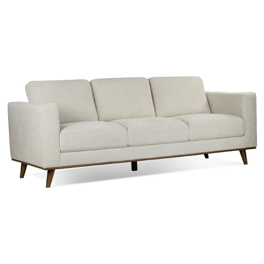 Divano Bishop in tessuto a coste bianche con gambe in legno di noce