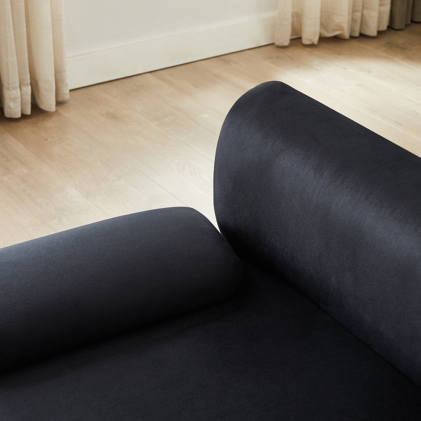 Divano trasformabile a L in tessuto nero 105 con pouf