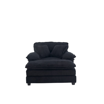 Divano a seduta profonda in velluto a coste nero con pouf