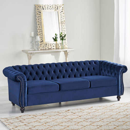 Divano Chesterfield blu a 3 posti con bottoni e borchie