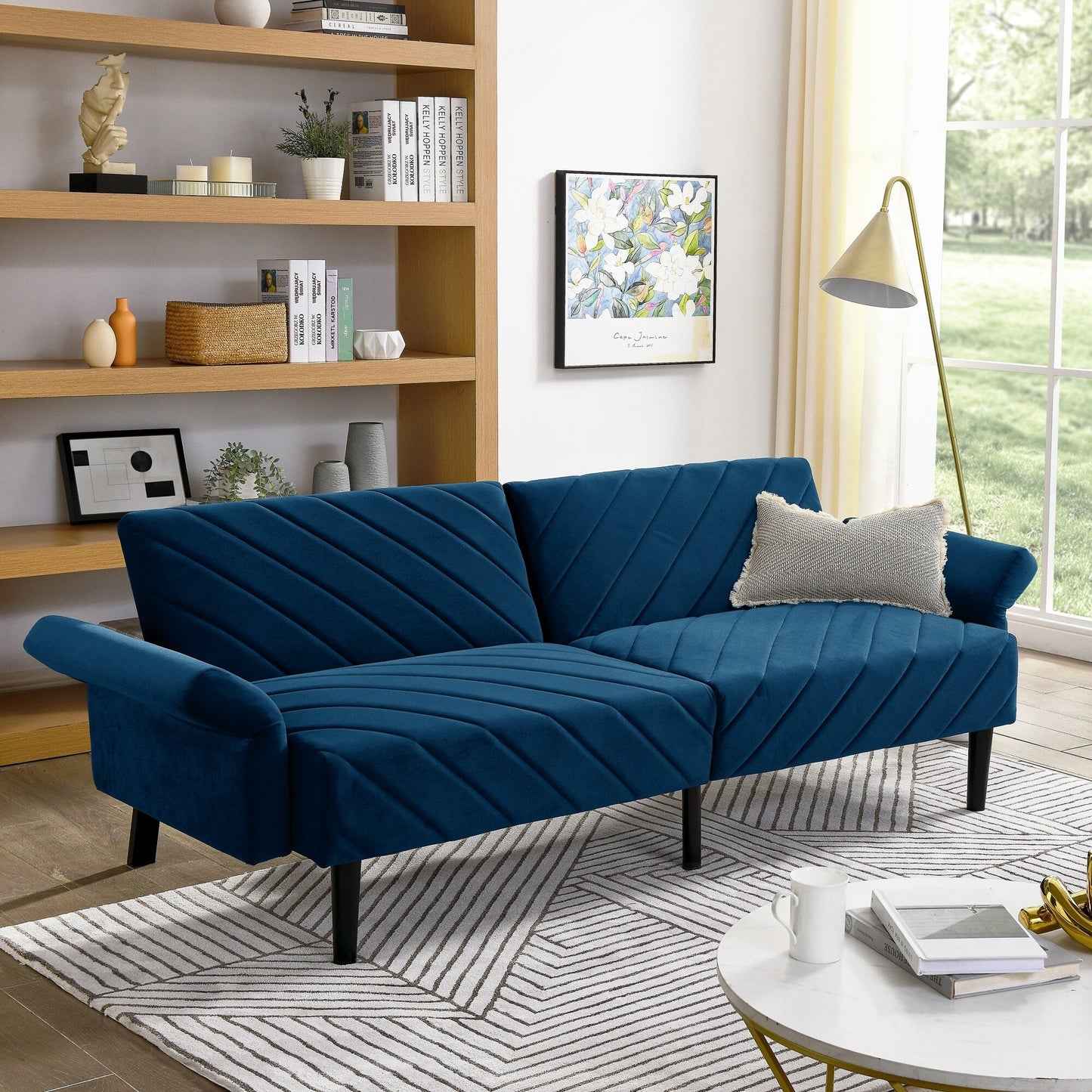 Divano letto futon trasformabile in velluto blu trapuntato
