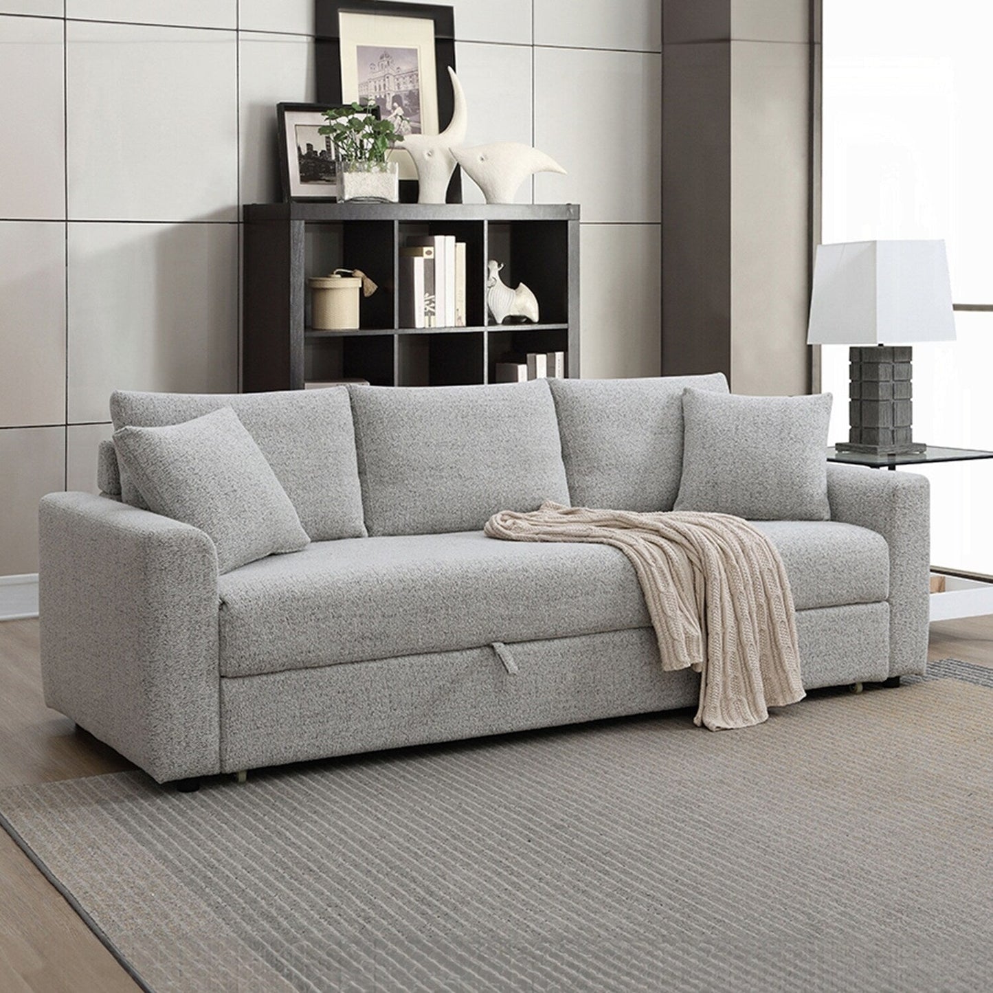 Divano imbottito in tessuto bouclé con letto estraibile, colore grigio