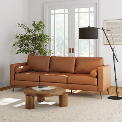 Divano Breeze Mid Century Modern, divano in pelle con cuscino trapuntato e struttura in legno massello