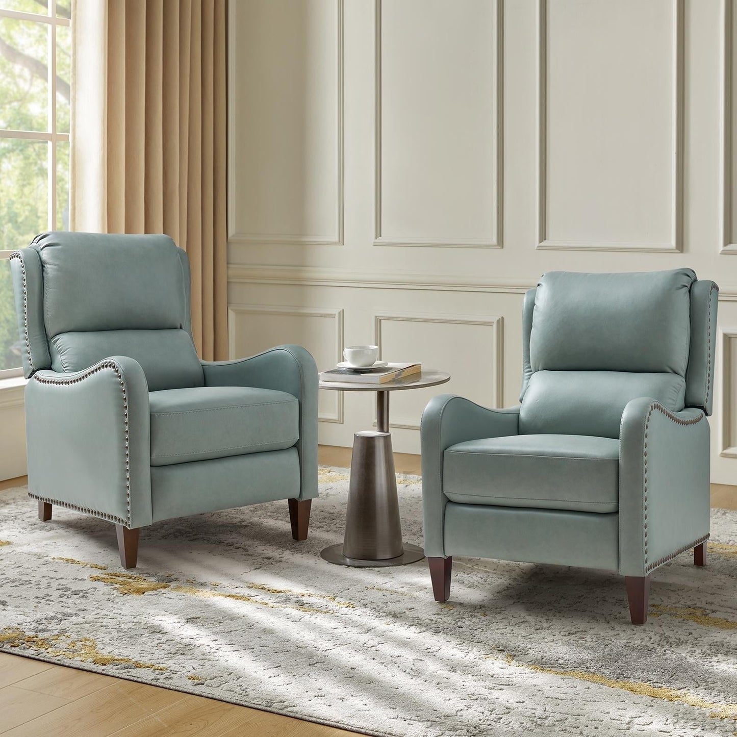 Poltrona reclinabile Brigida Modern in vera pelle con finiture in borchie e poggiapiedi regolabile, set da 2 di HULALA HOME