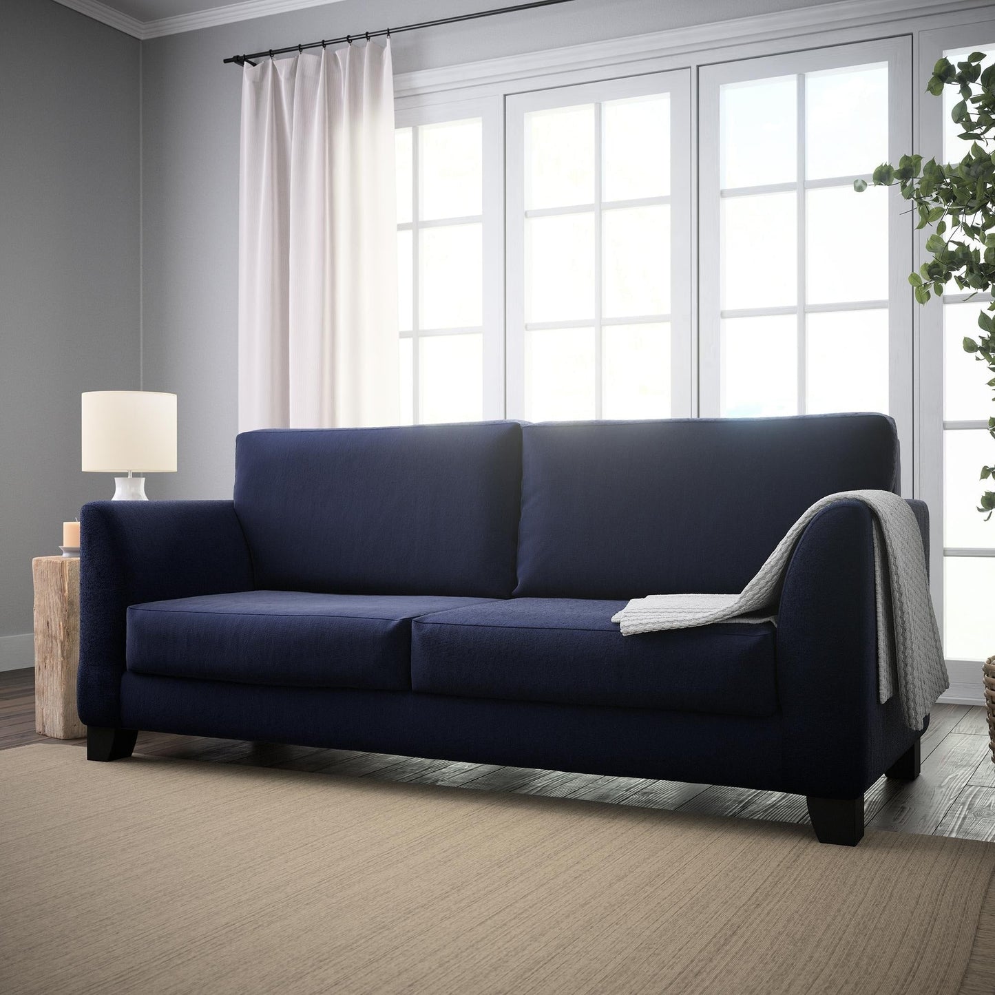 Divano imbottito con braccioli svasati Brookside Holly 85