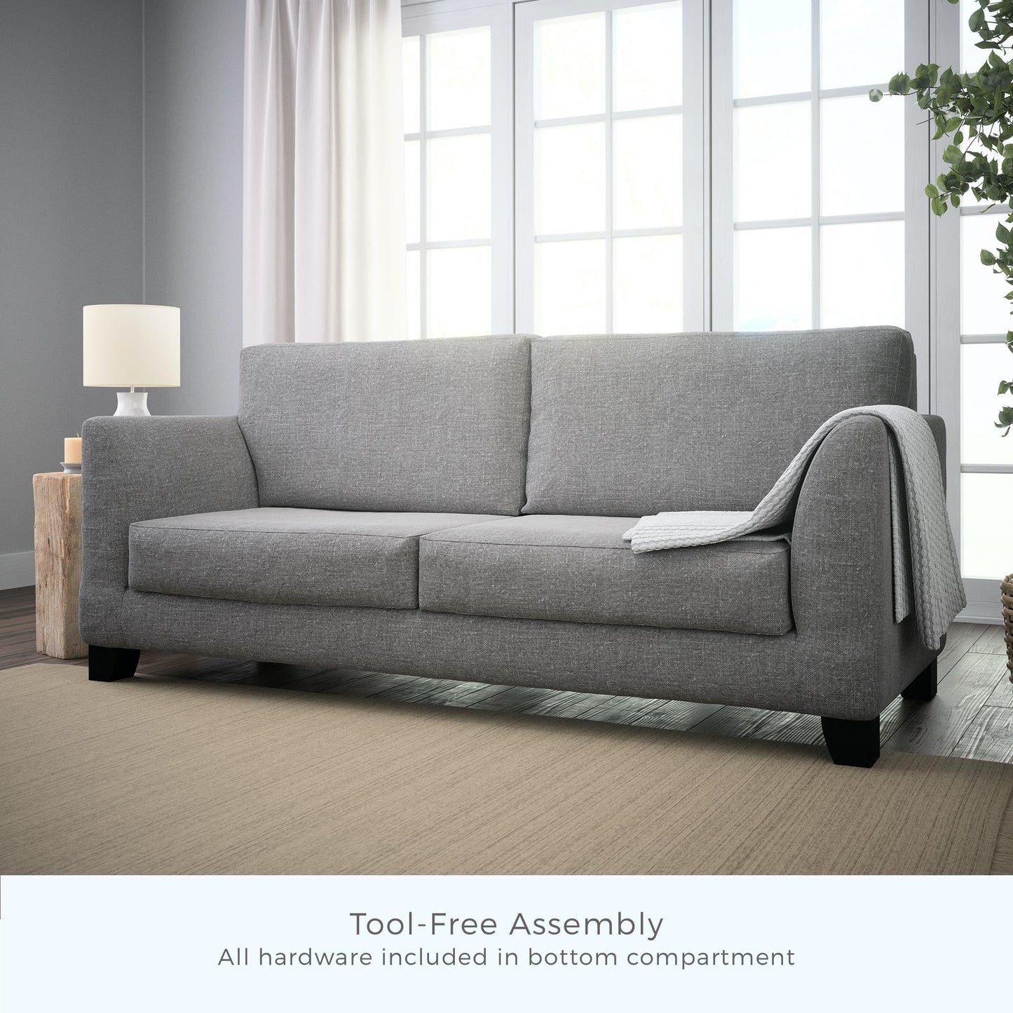 Divano imbottito con braccioli svasati Brookside Holly 85