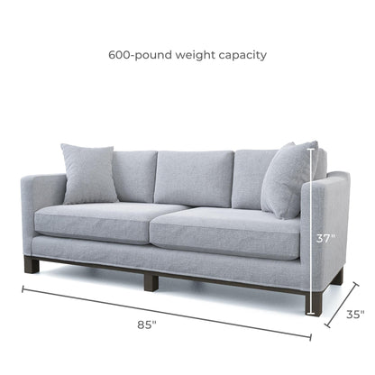 Divano imbottito con base in legno Brookside Kay