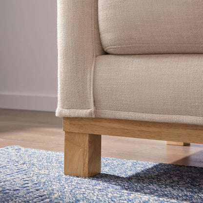 Divano imbottito con base in legno Brookside Kay