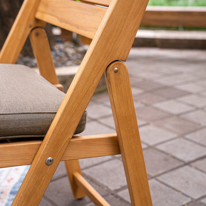 Set da pranzo pieghevole da esterno Cambridge Casual Miami da 7 pezzi in teak con cuscino per seduta Sunbrella