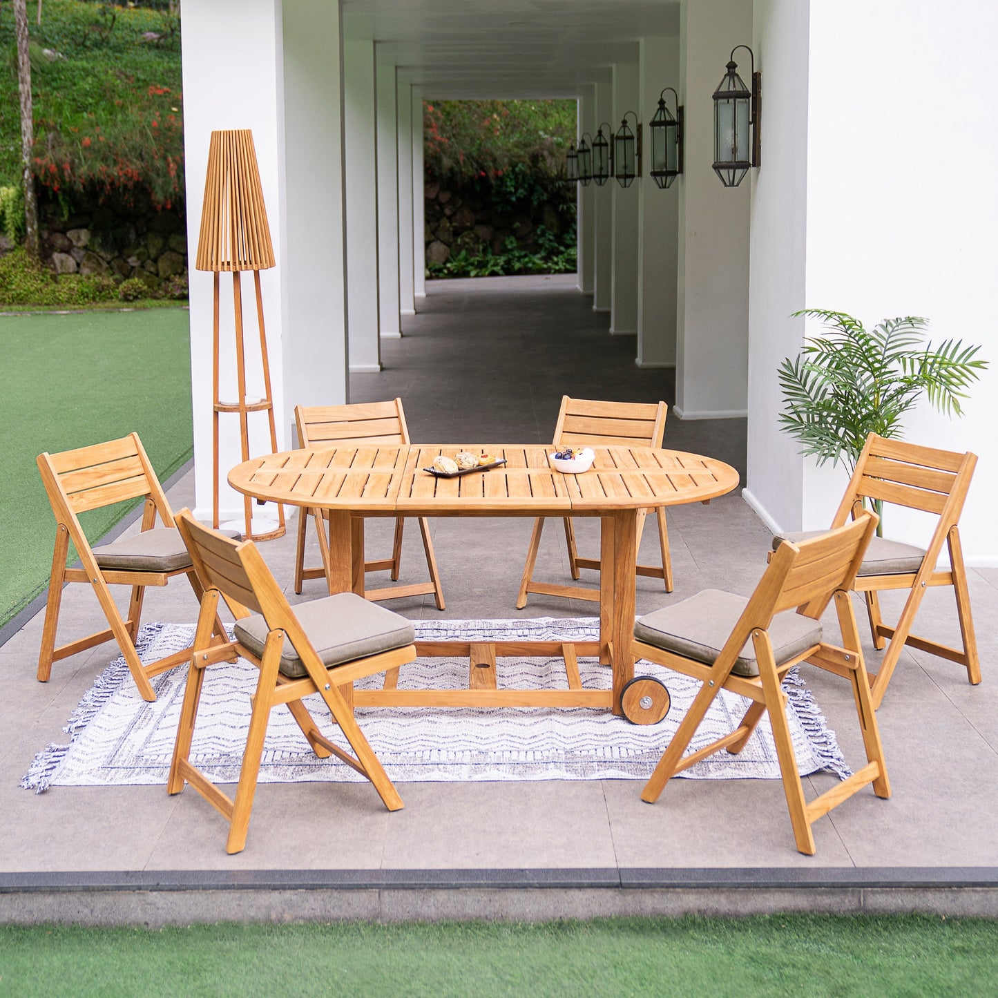 Set da pranzo pieghevole da esterno Cambridge Casual Miami da 7 pezzi in teak con cuscino per seduta Sunbrella
