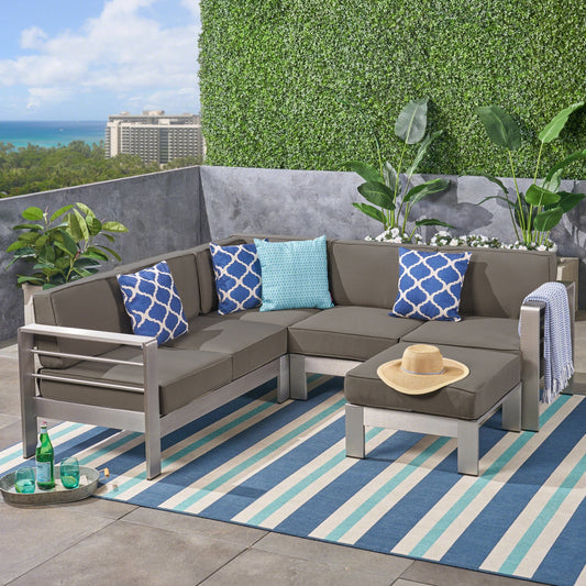 Set di divani componibili in alluminio a forma di V da 5 posti Cape Coral Outdoor con pouf di Christopher Knight Home