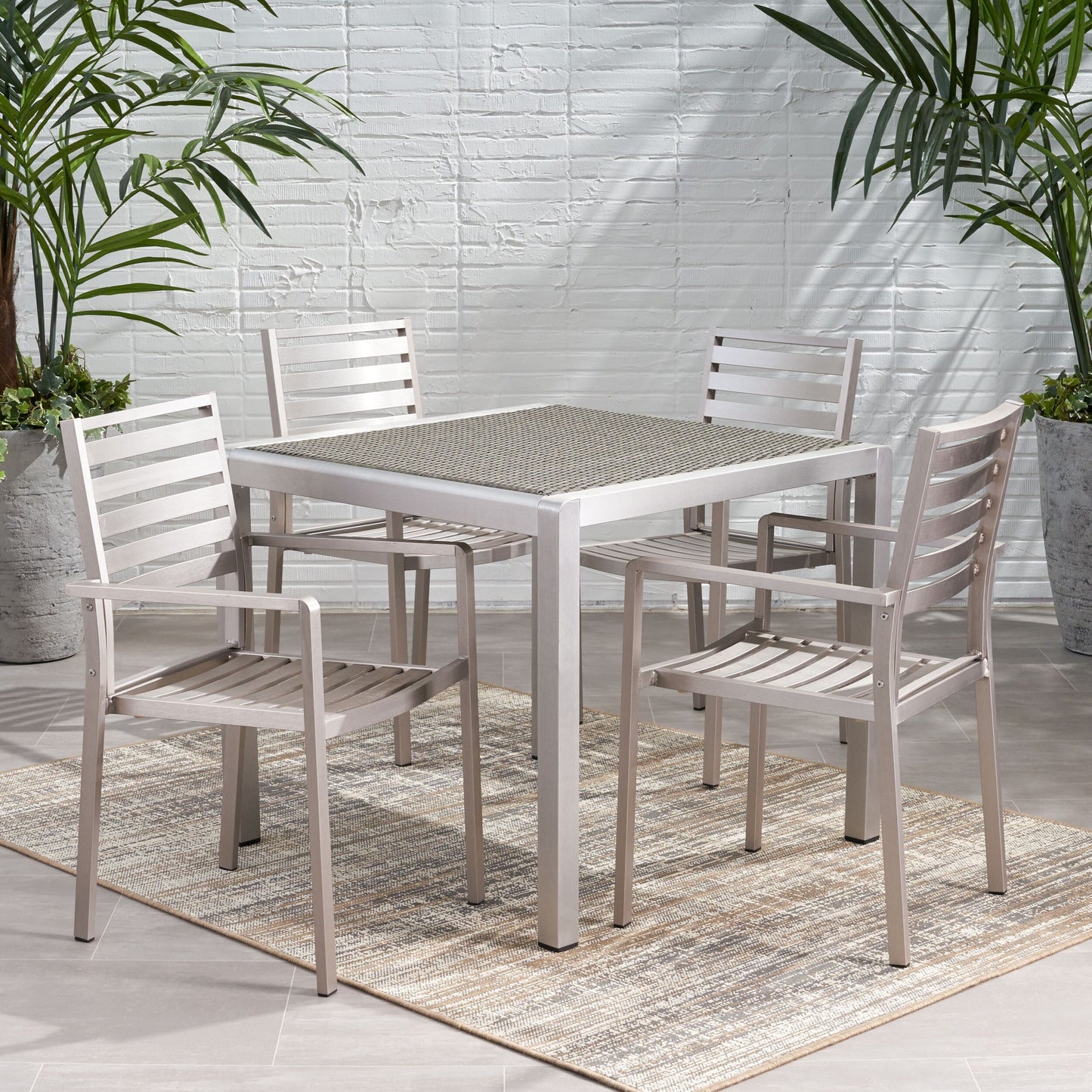 Set da pranzo moderno da esterno Cape Coral da 4 posti in alluminio con piano in vimini di Christopher Knight Home