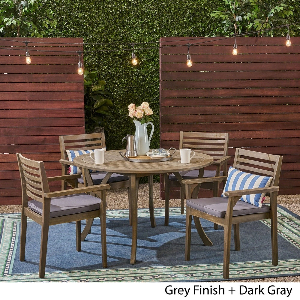 Set da pranzo rotondo in acacia da 4 posti Casa Outdoor con gambe intagliate di Christopher Knight Home