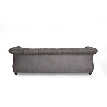 Divano Chesterfield a 3 posti con bottoni e borchie