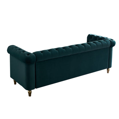 Divano Chesterfield in velluto con finiture dorate
