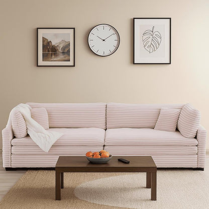 Divano classico ed elegante a tre posti rivestito in velluto a coste con due cuscini decorativi